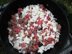 Dutch Oven Cowboy Stew, adding onions