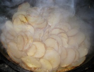 Dutch Oven Delmonico Potatoes Steaming