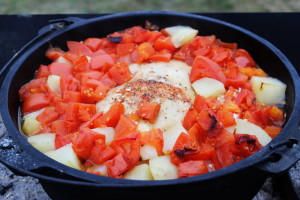 Dutch Oven Tomato Braised Chicken Almost Done