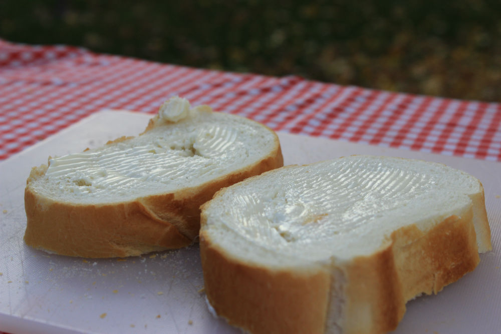 Buttering the French Bread